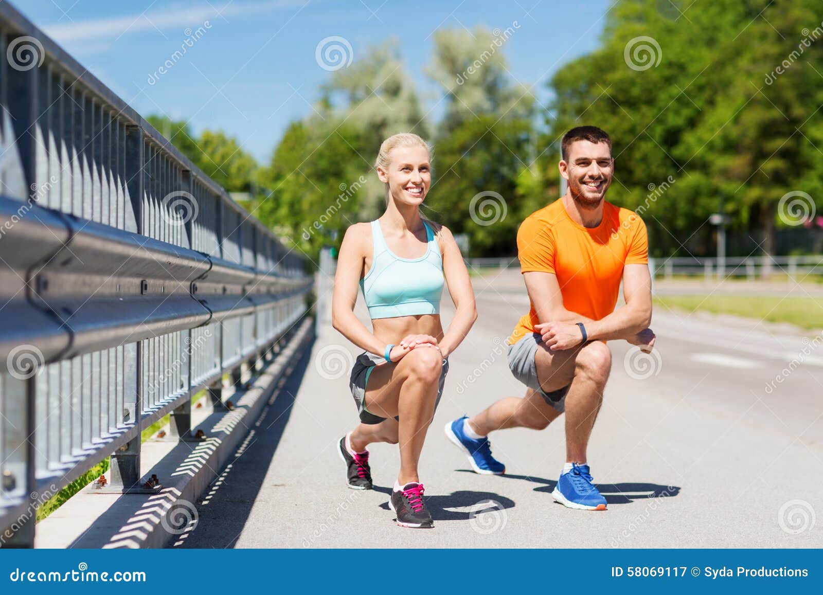 Smiling Young Couple Training Outside Together · Free Stock Photo