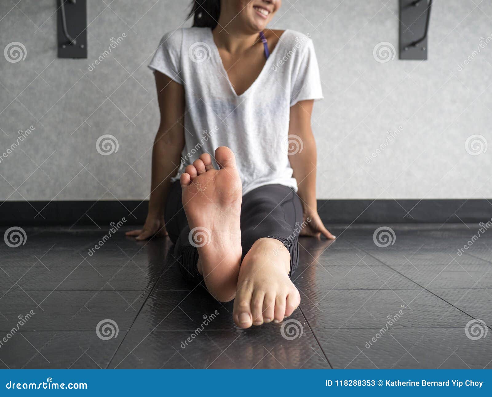 Smiling Dancer Warming Up Her Feet With Alternating Pointing And Flexing Stock Image Image Of