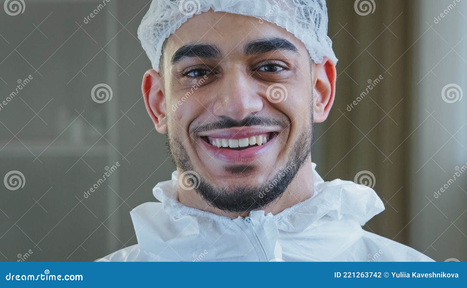smiling doctor arabic surgeon hispanic nurse medical worker in special uniform hat looks at camera smile toothy after