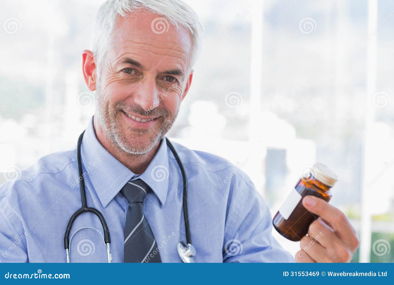 Smiling Doctor Holding Medicine Jar Stock Image - Image of happy ...