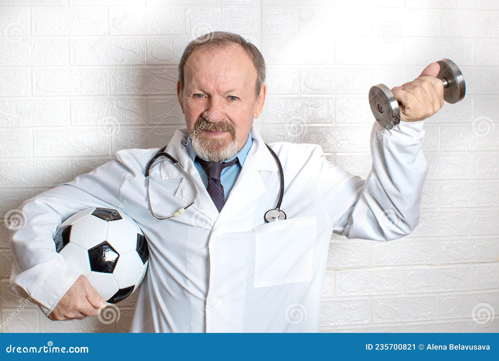 Doctor with soccer ball Stock Photo by ©camaralenta 76732445