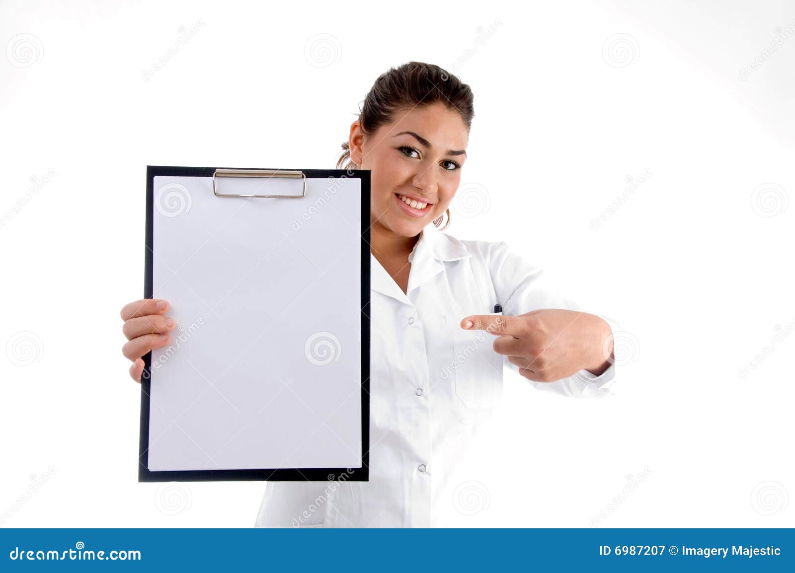 smiling doctor indicating the writing board
