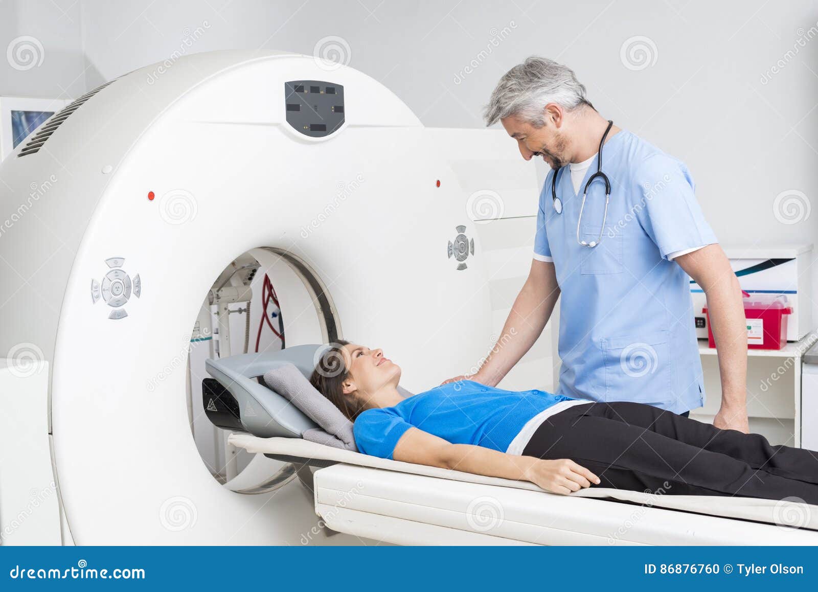 Smiling Doctor Talking To Patient Lying CT Scan Machine Stock Photo - Image of hospital, people: 86876760