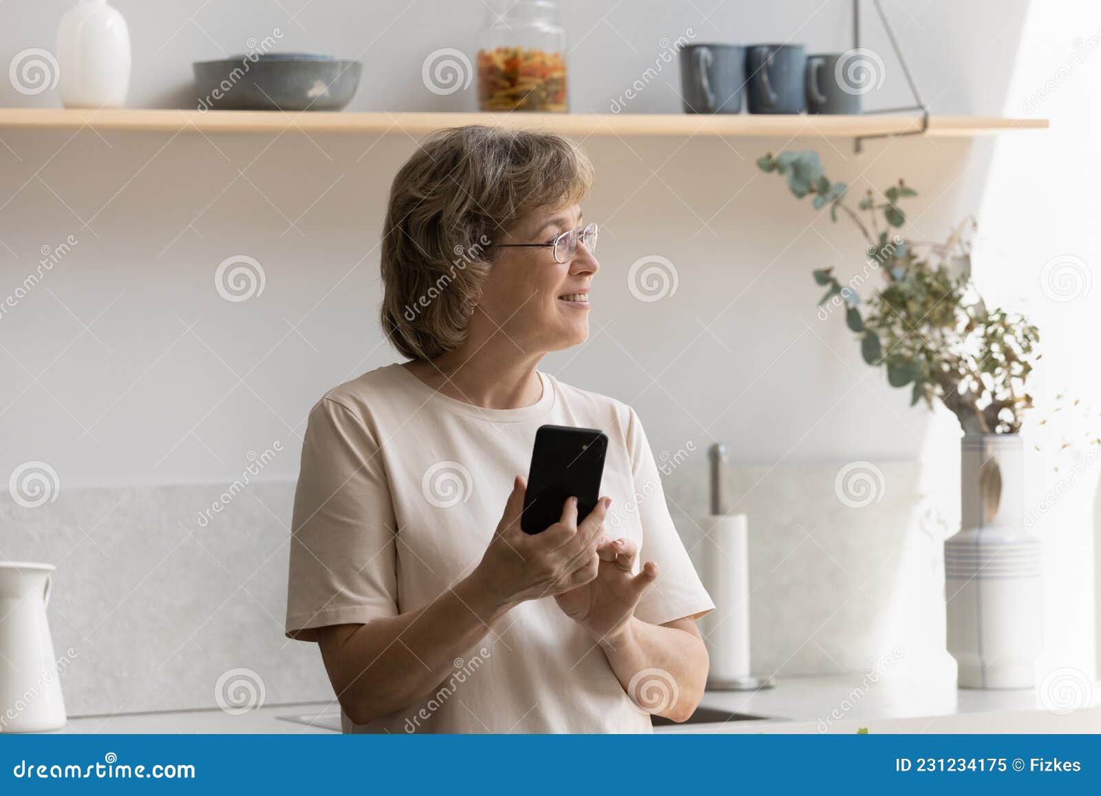 Smiling Dreamy Middle Aged Mature Woman Using Cellphone Stock Image Image Of Happy Older