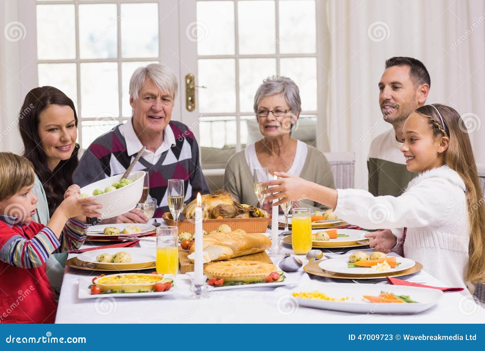 Smiling Extended Family at the Christmas Dinner Table Stock Image ...