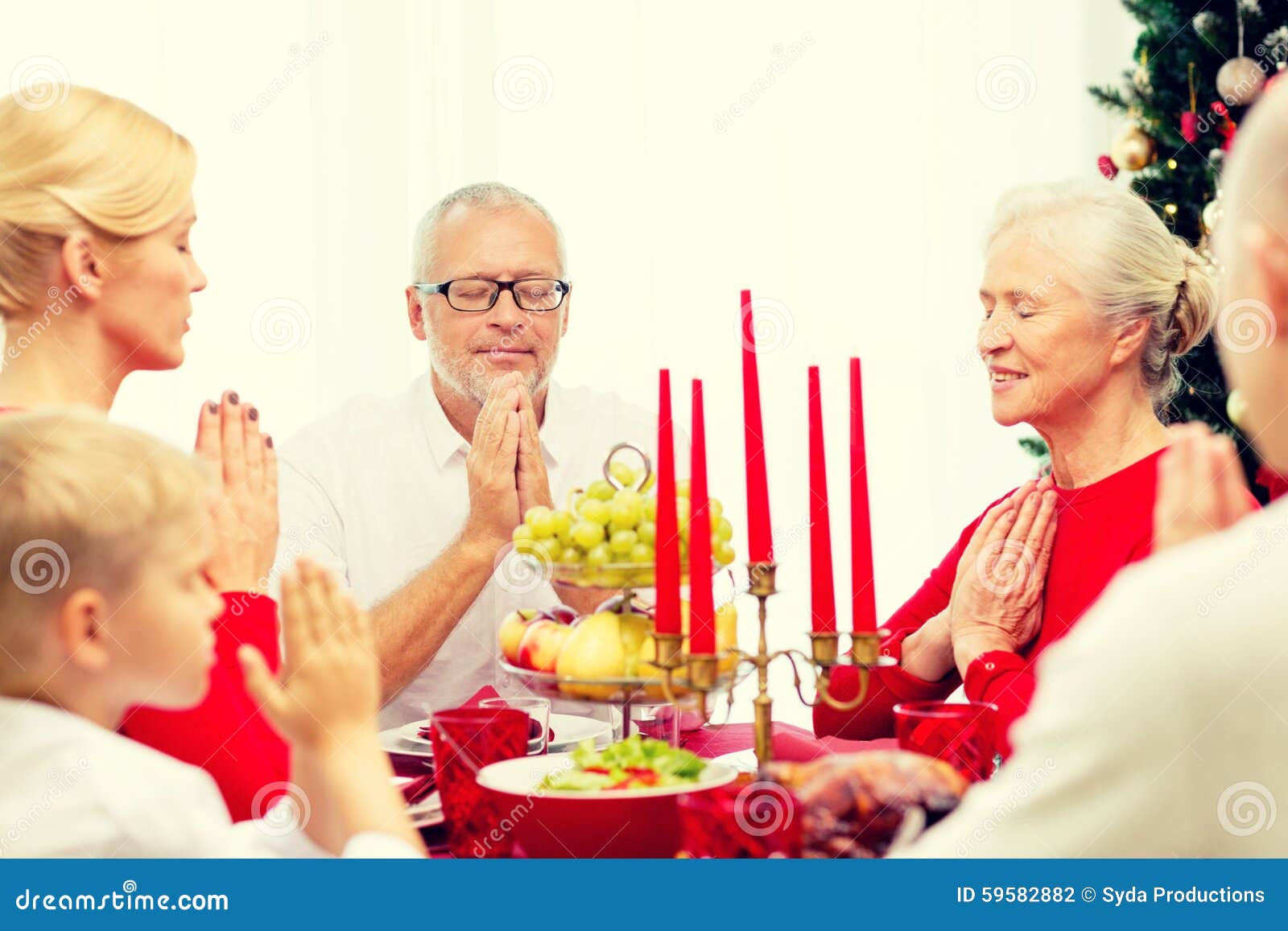 Smiling Family Having Holiday Dinner at Home Stock Photo - Image of