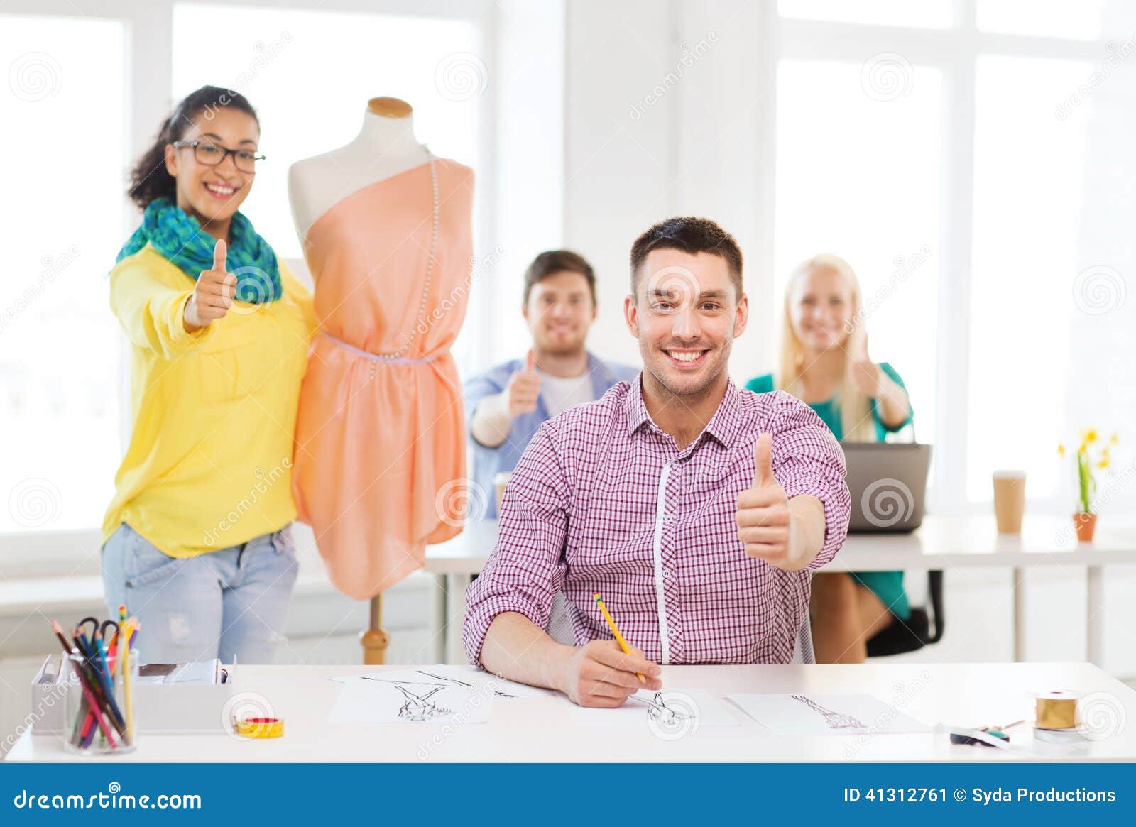 Smiling Fashion Designers Working in Office Stock Image - Image of ...