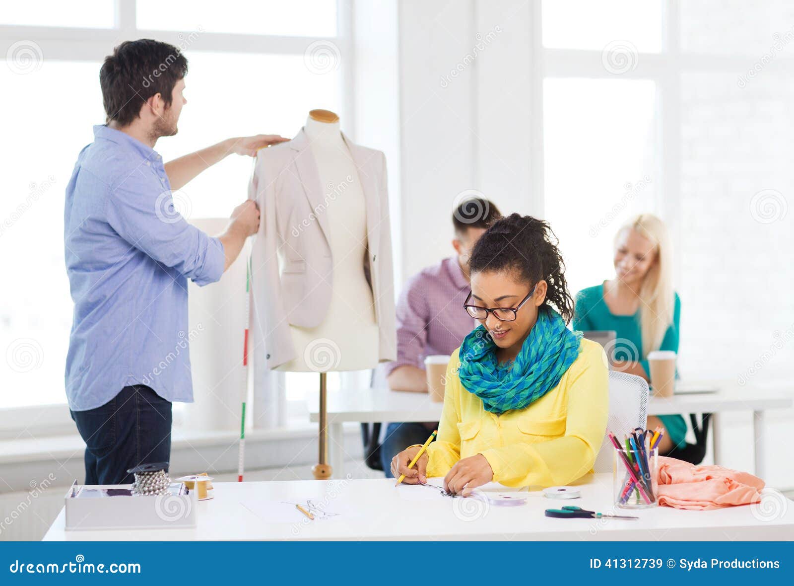 Smiling Fashion Designers Working in Office Stock Image - Image of ...