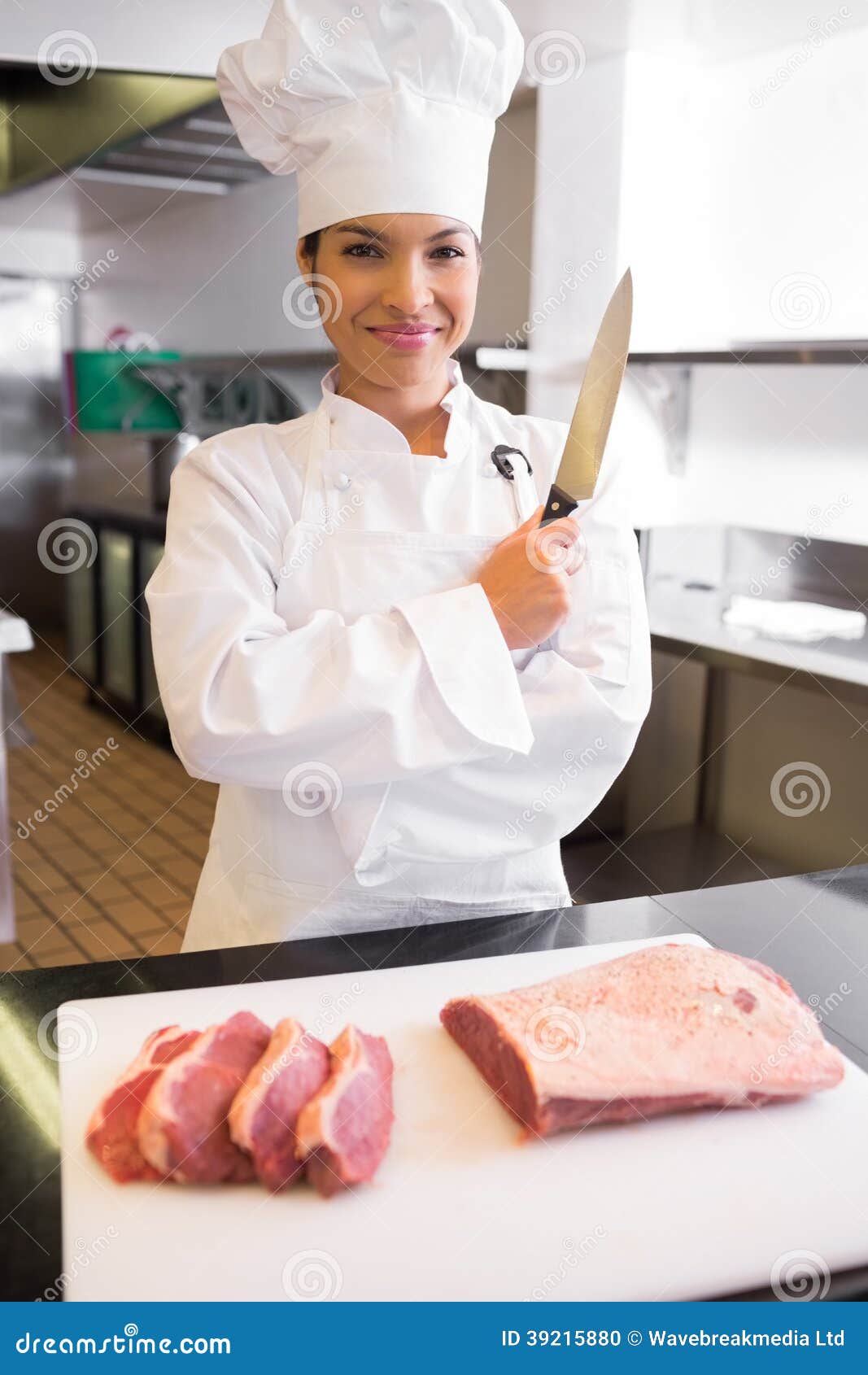 Smiling Female Chef Cutting Meat In Kitchen Stock Photo Image 39215880