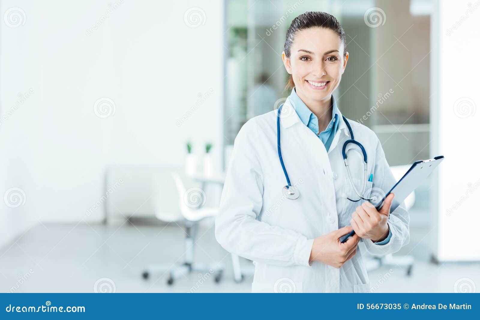 smiling female doctor holding medical records