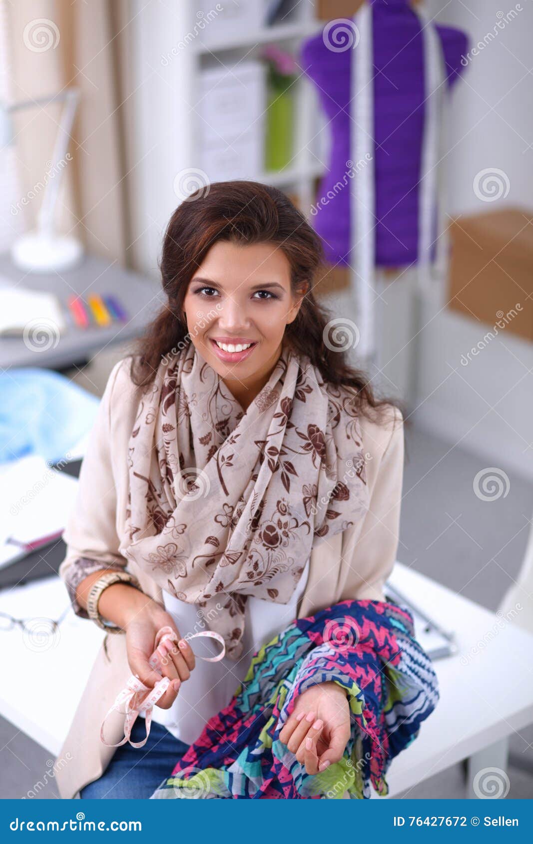 Smiling Female Fashion Designer Sitting at Office Desk Stock Photo ...