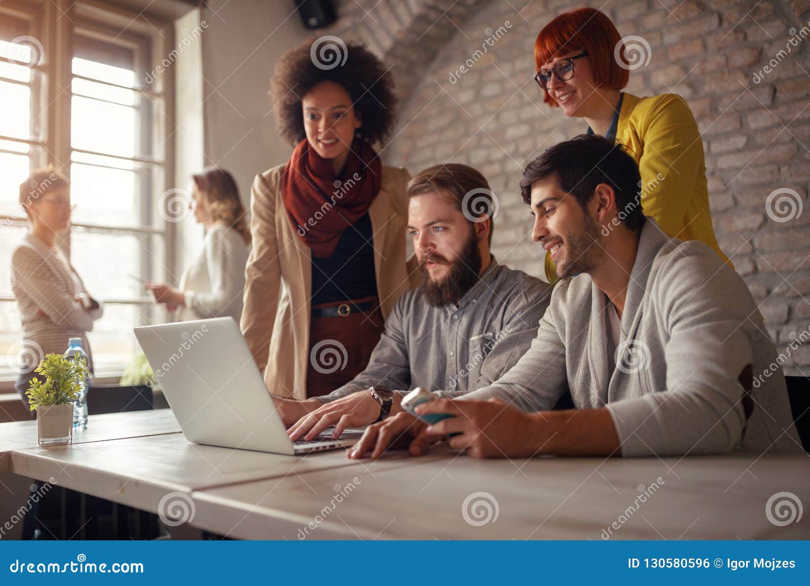 smiling freelance web ers brainstorming