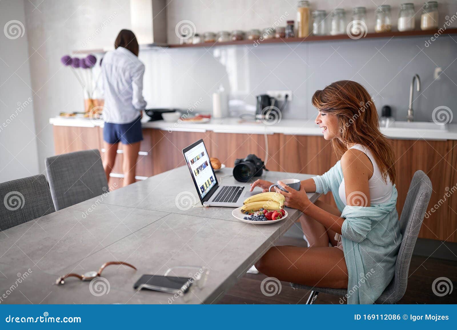 Smiling Gay Lasbian Couple At Morning In Kitchen Having Fun St
