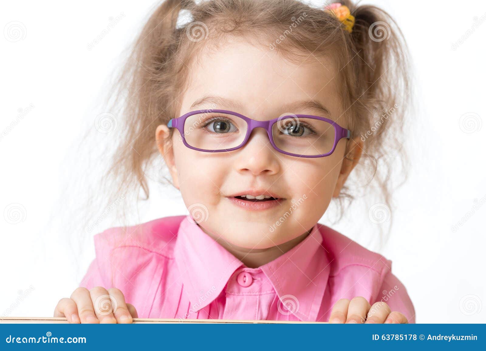 smiling girl wearing glasses closeup portrait