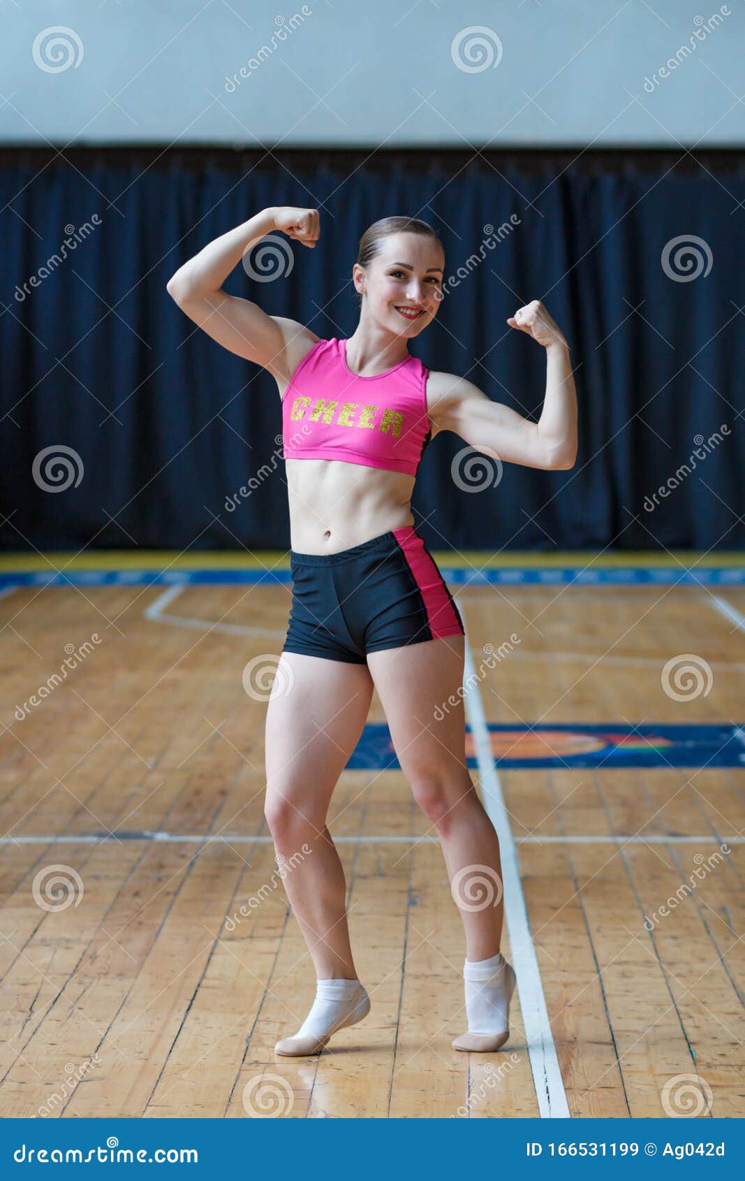 young girls flexing biceps
