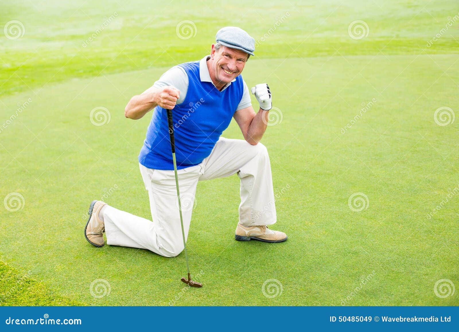 Smiling Golfer Kneeling on the Putting Green Stock Image Image of