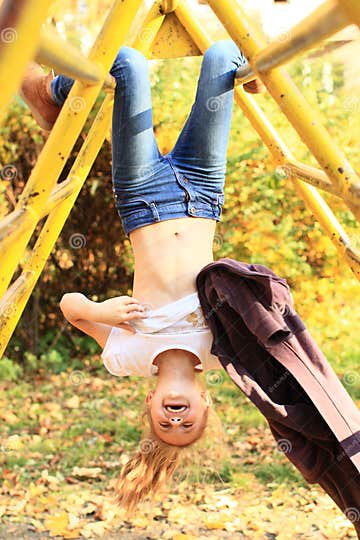 Smiling hanging girl stock photo. Image of leaf, girl - 34376650