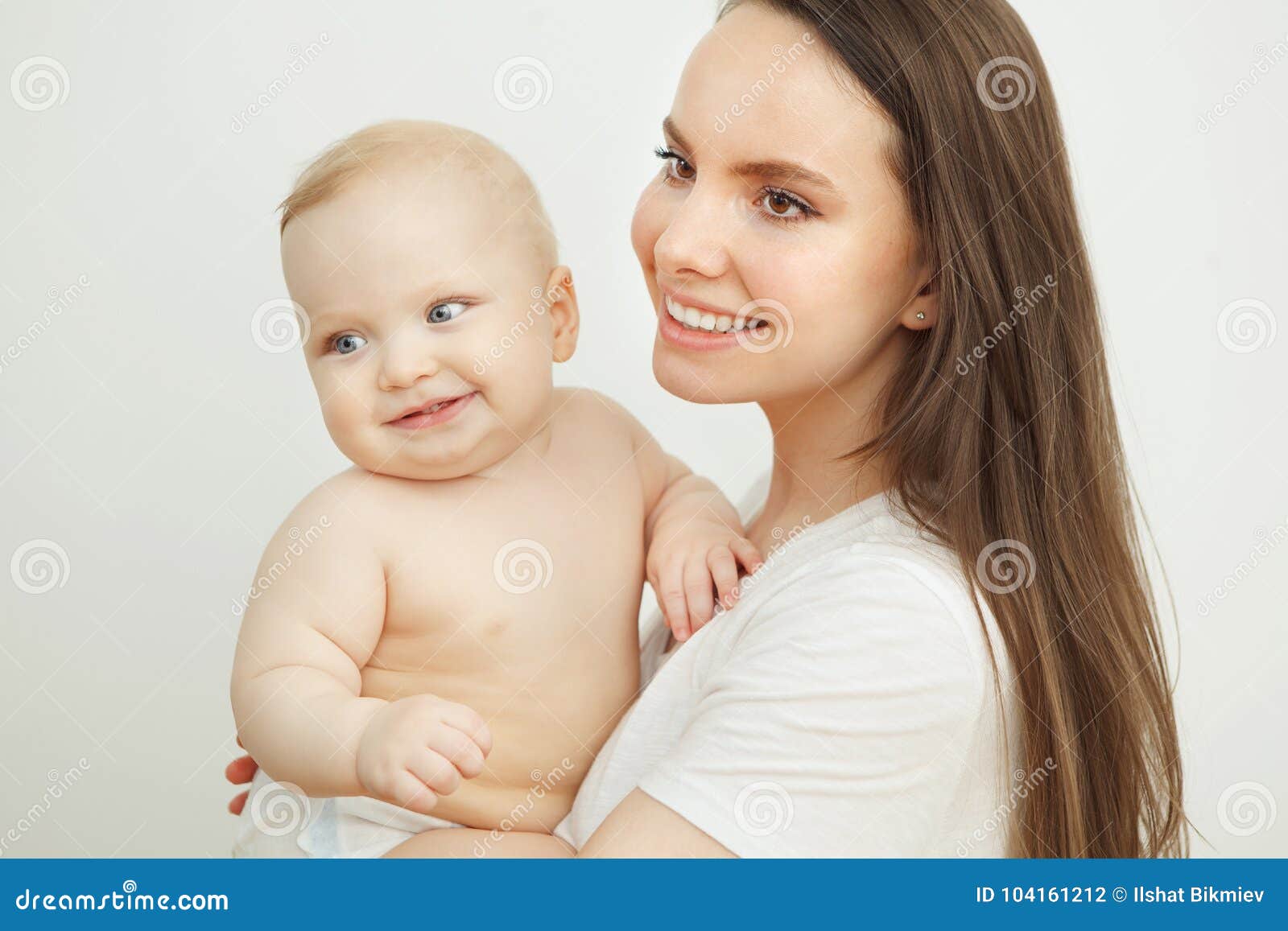 smiling happy baby in mothers`s hand. little enfant toddler