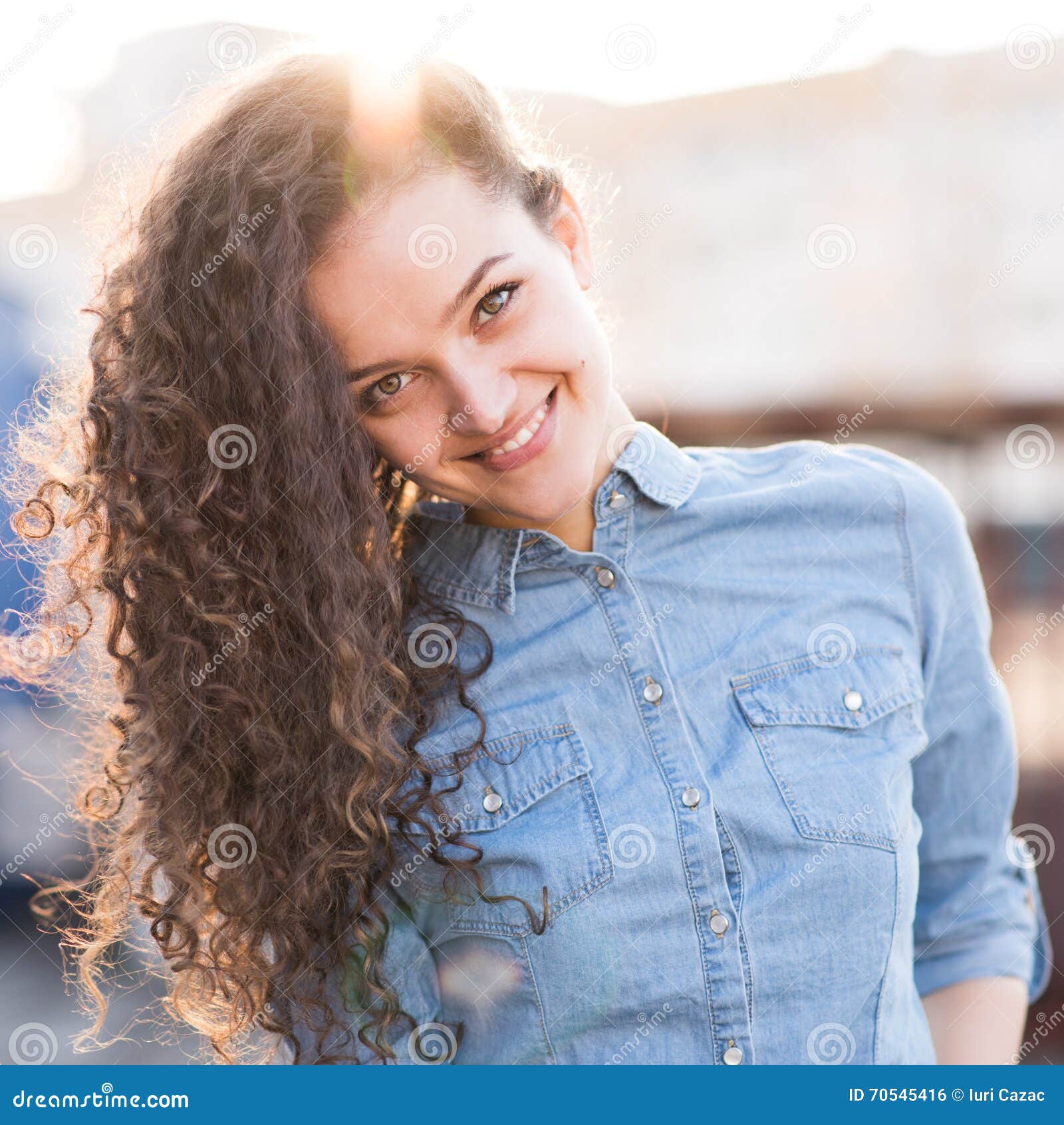 Smiling and Happy Young Woman Look at One Side with Curly Hair Stock Photo  - Image of female, beauty: 70545416