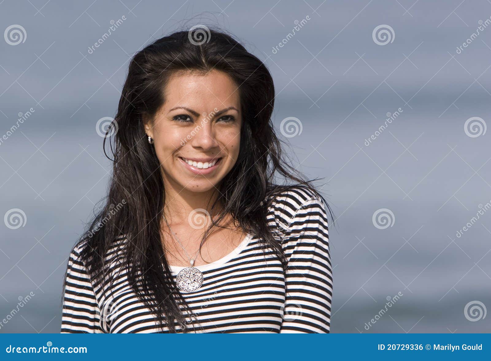 smiling hispanic woman