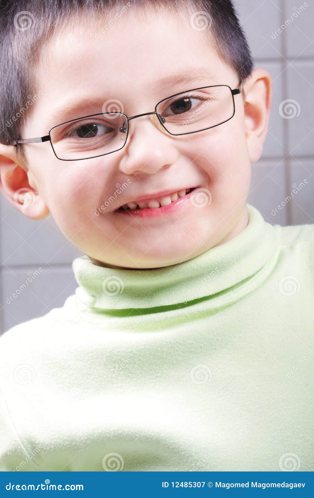 Smiling kid in eyeglasses stock image. Image of eyeglasses 12485307