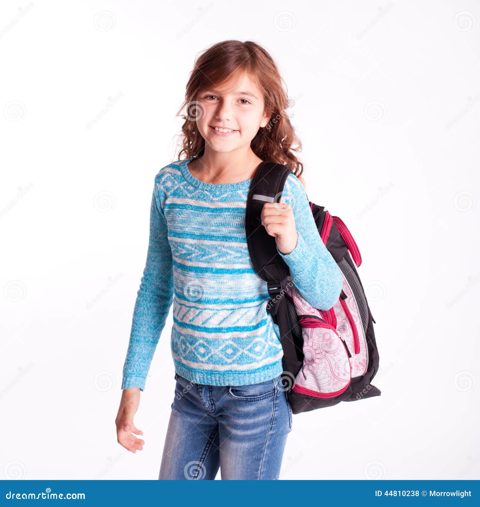 kid holding backpack