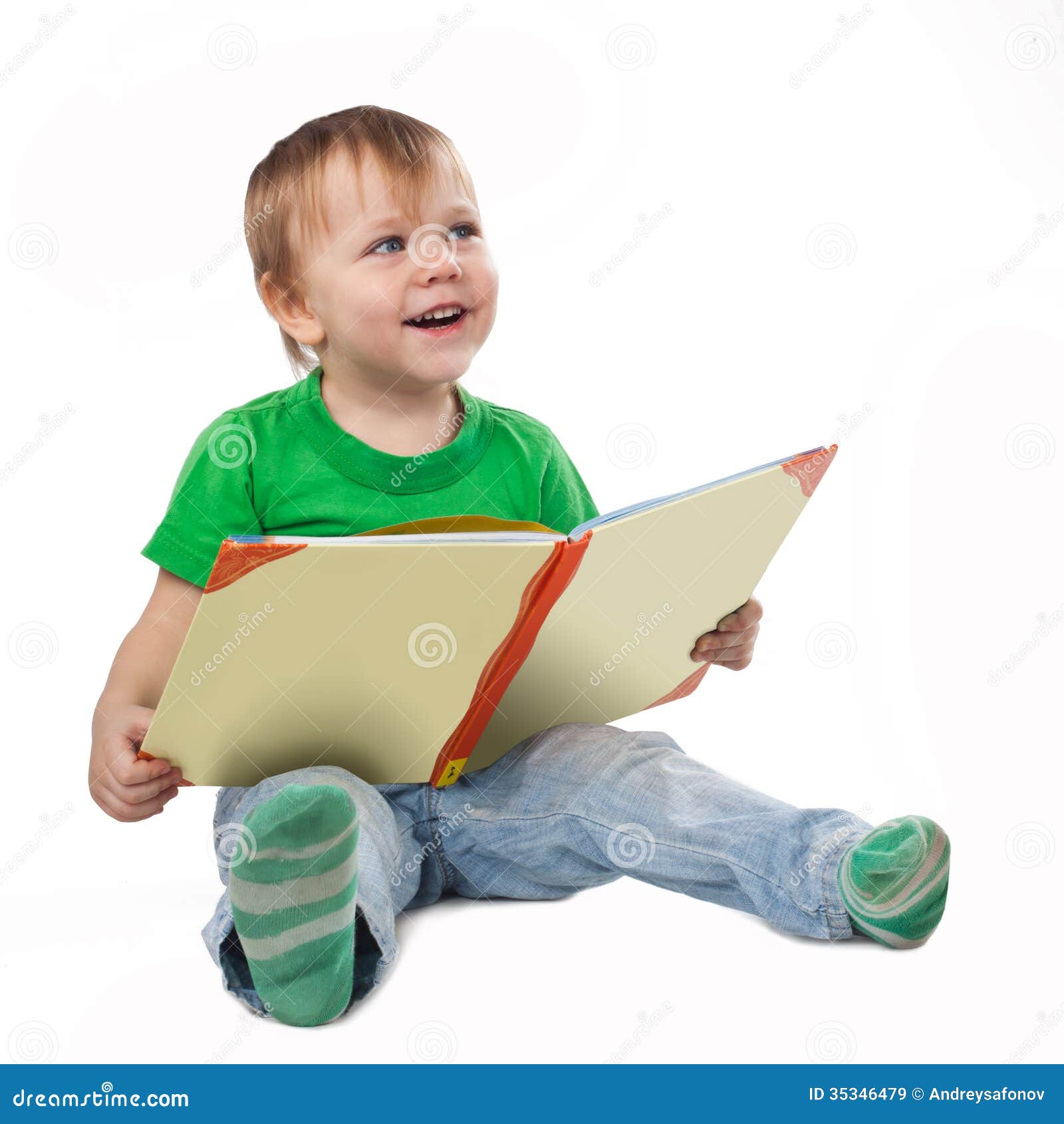 Smiling Little Boy with a Book Sitting on the Floor Stock Image - Image ...