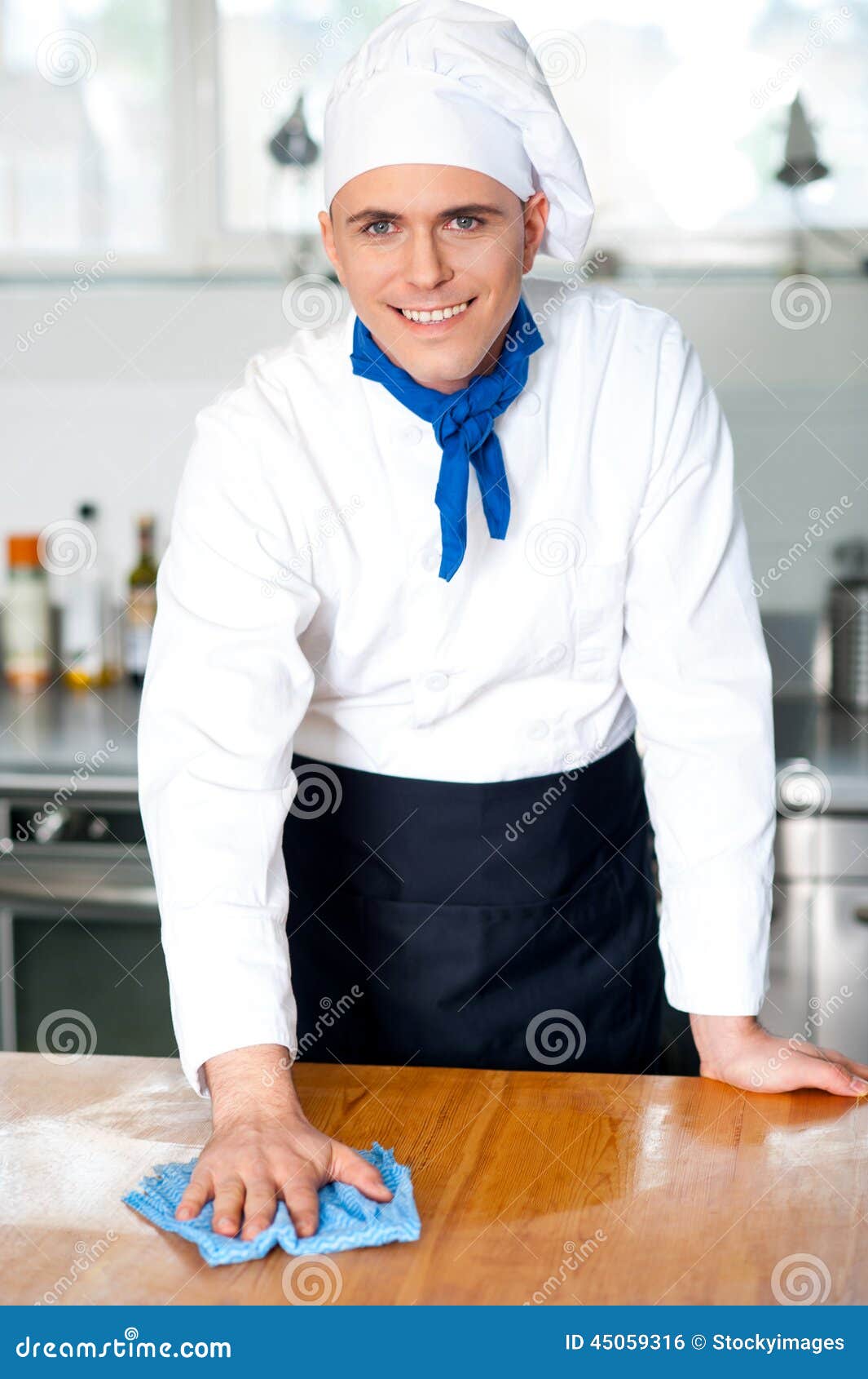 Smiling Male Chef Cleaning the Kitchen Table Stock Photo Image of