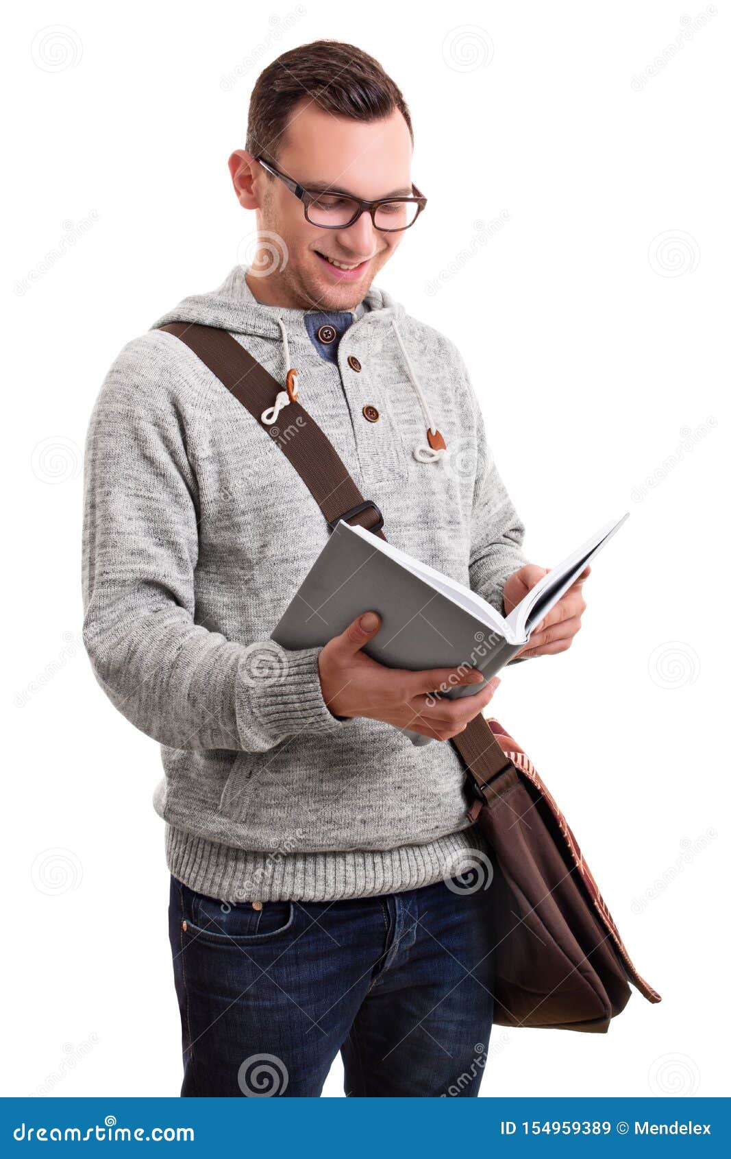 Smiling Male Student with a Book Stock Image - Image of hands ...