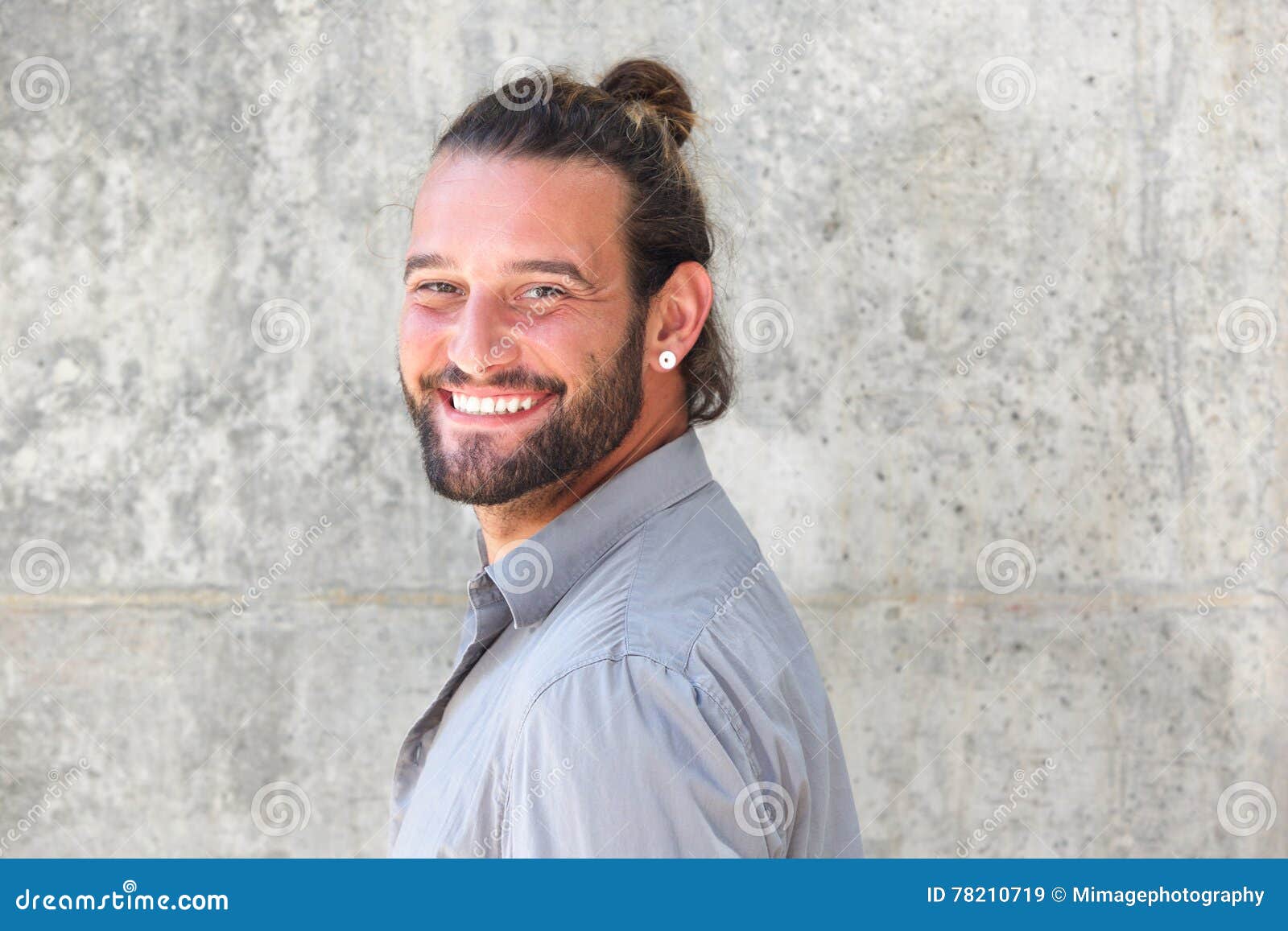 Smiling Man with Beard Looking Over Shoulder Stock Image - Image of ...