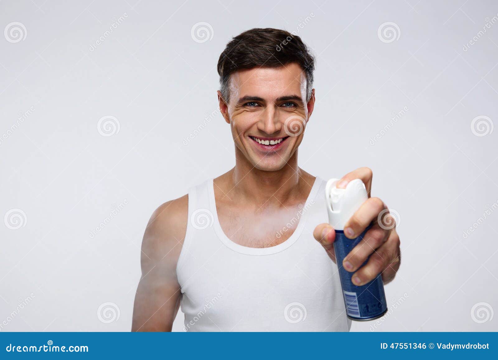 Smiling Man Spraying Deodorant Stock Photo Image of clean, armpit