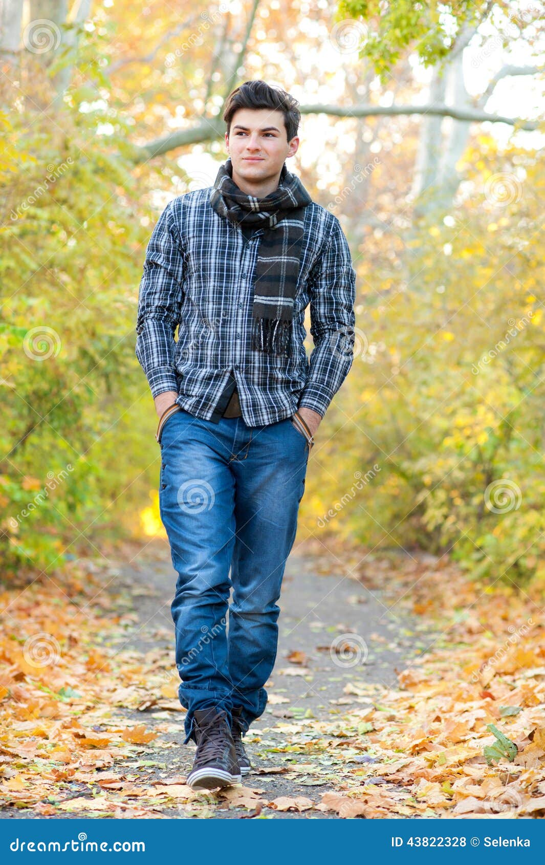 Smiling Man Walking in Autumn Park. Stock Photo Image of fall, hair