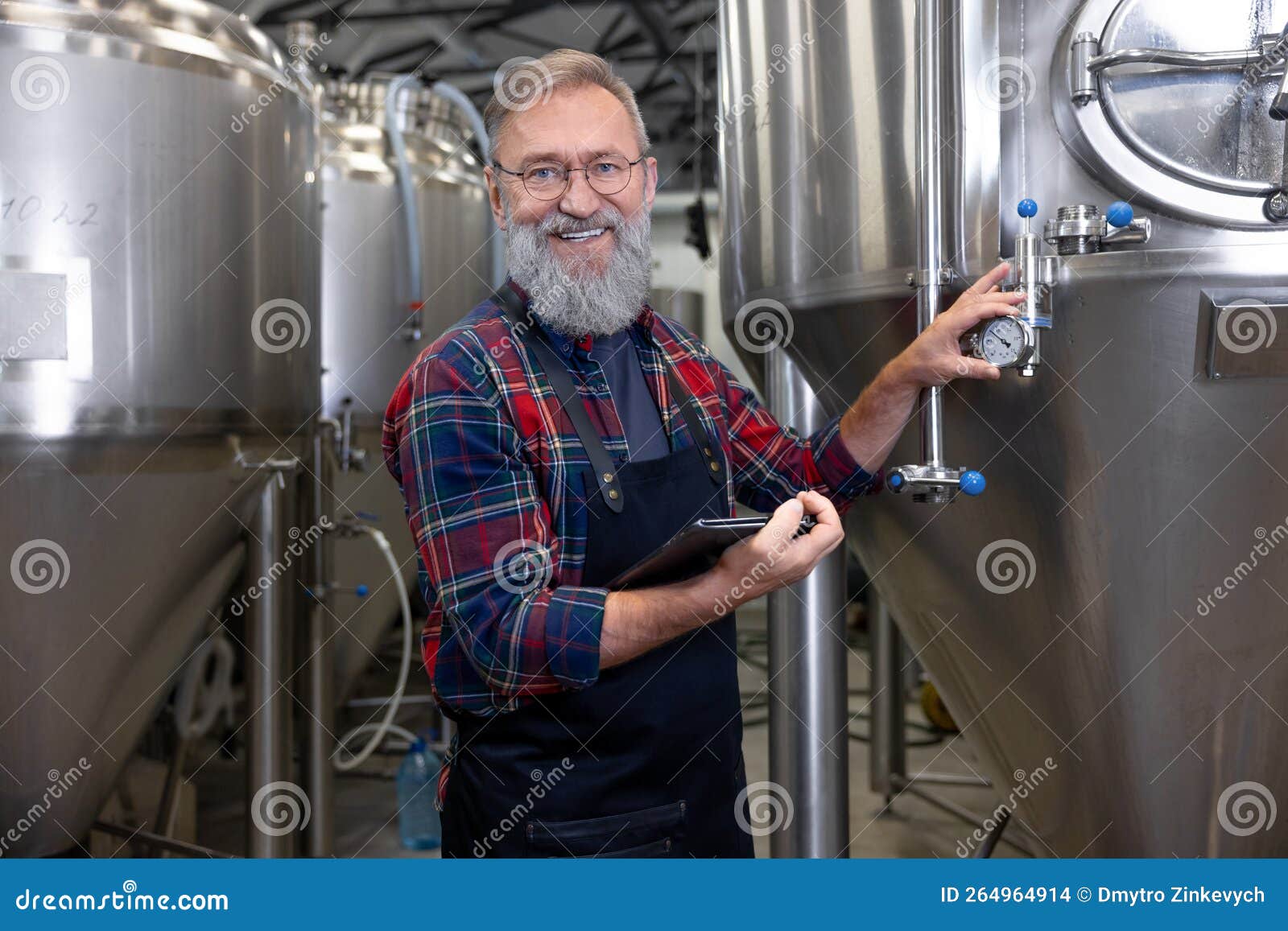 Smiling Mature Brewery Worker at His Working Place Stock Photo Image