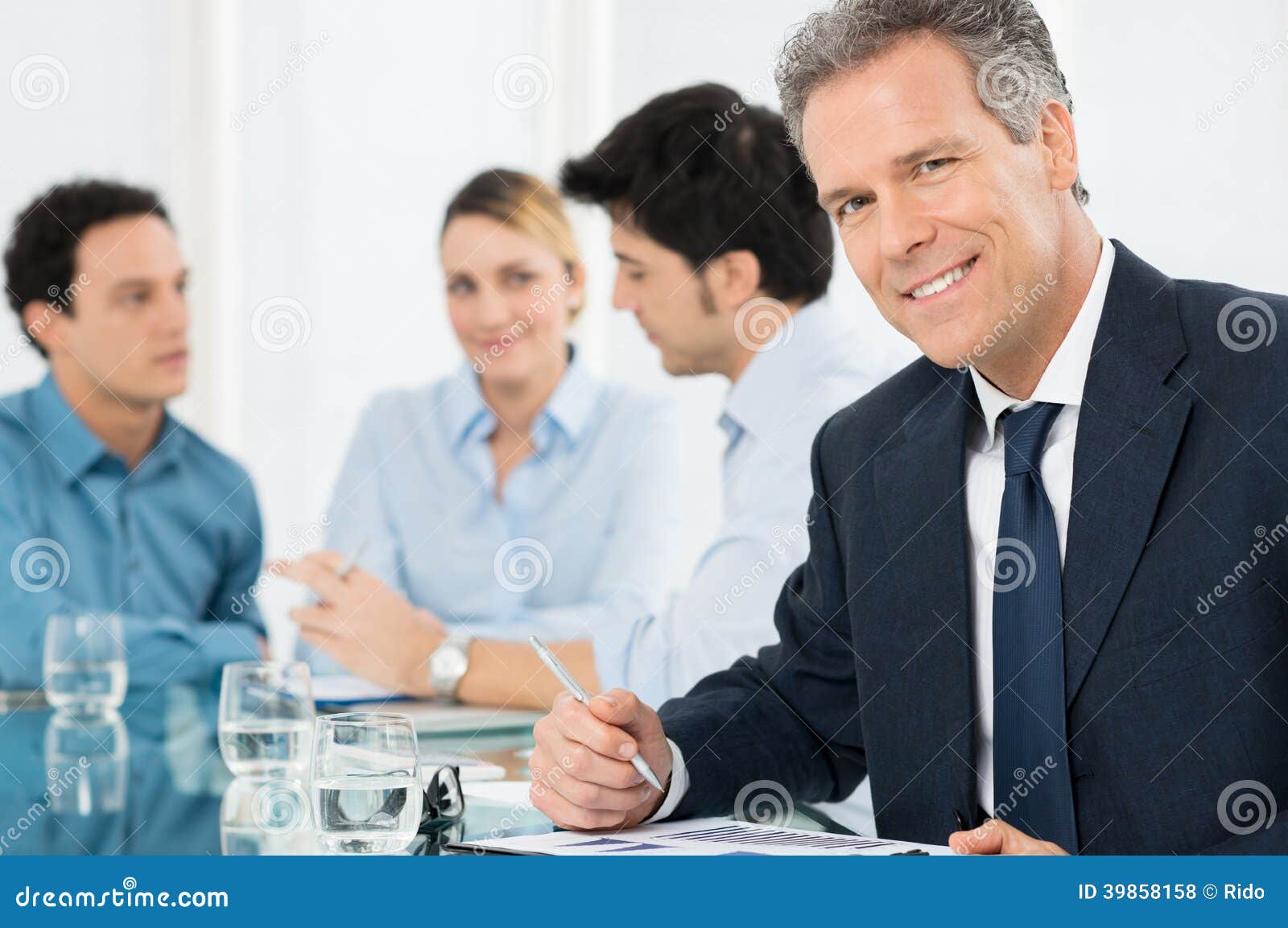 Smiling Mature Businessman stock photo. Image of brainstorming - 39858158