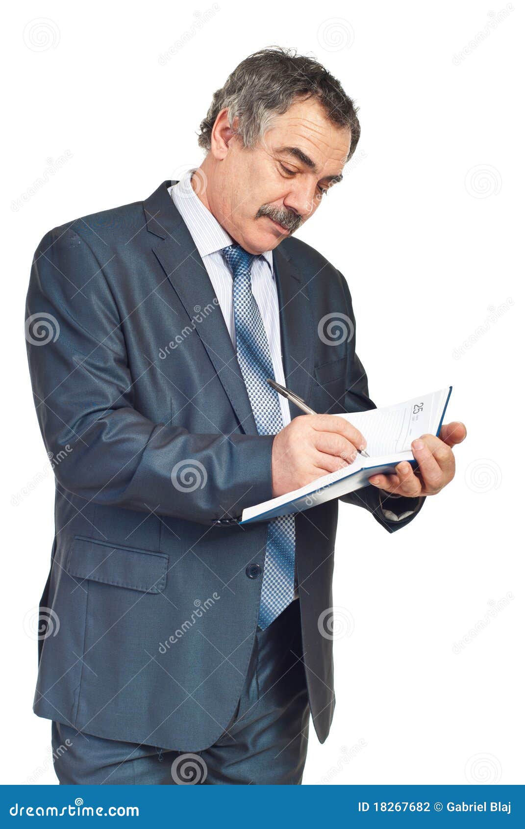 Smiling Mature Executive Taking Notes In Agenda Stock Photo Image of