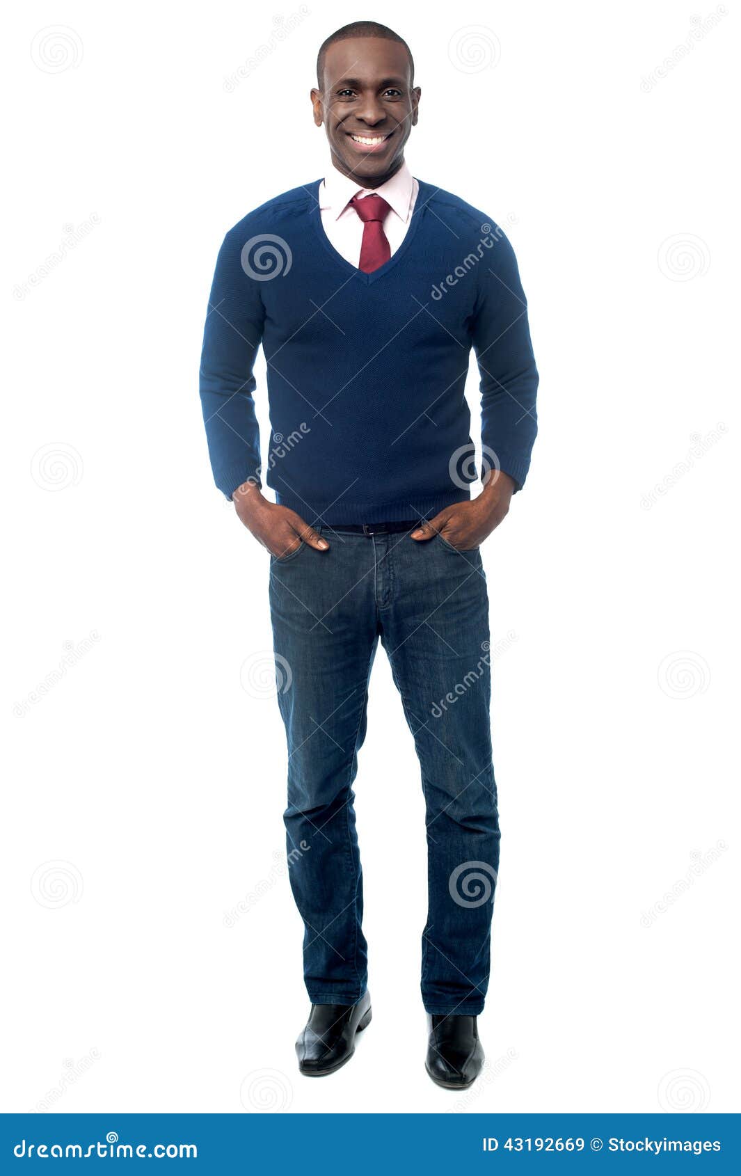Smiling middle aged businessman posing. Handsome male business executive, hands in pockets