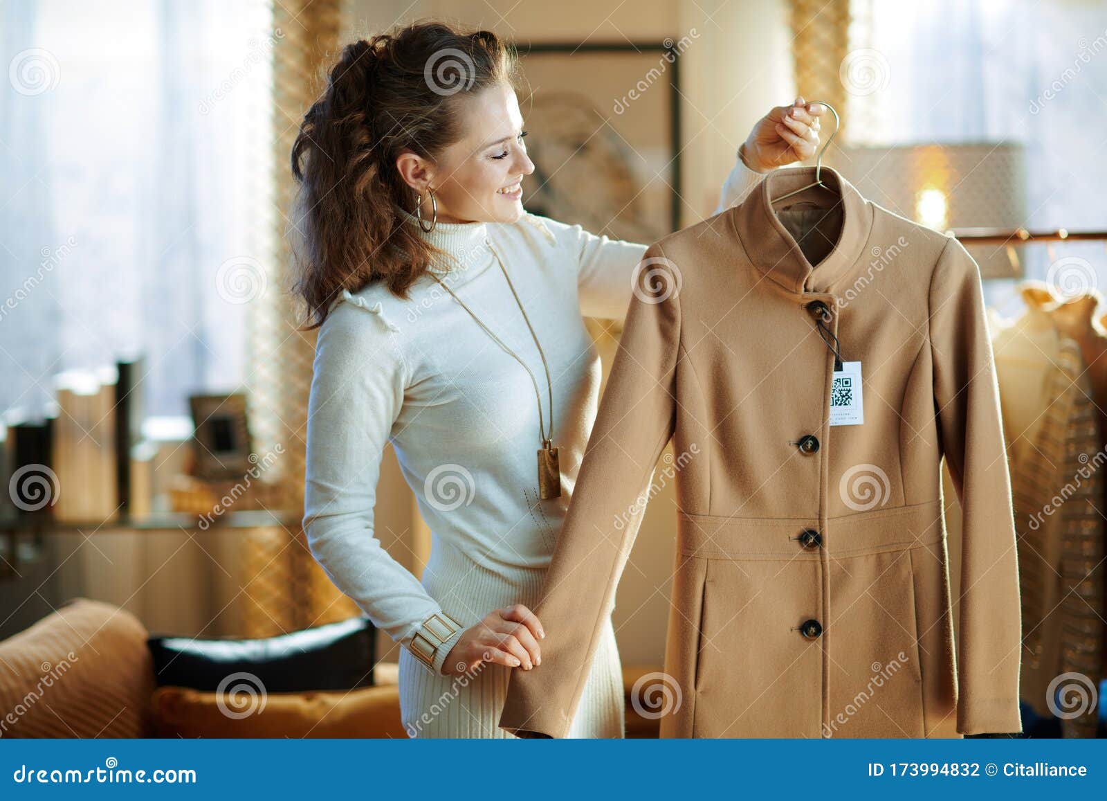 Smiling Modern Female Holding on Hanger Purchased New Coat Stock Photo ...