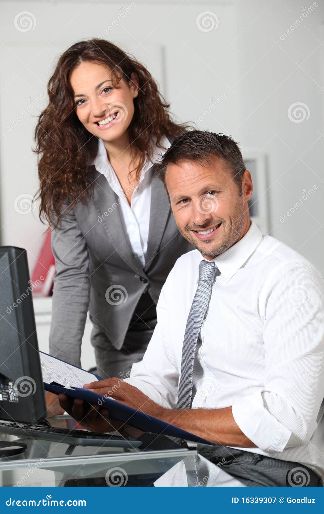 Smiling office workers stock image. Image of office, assistant 16339307