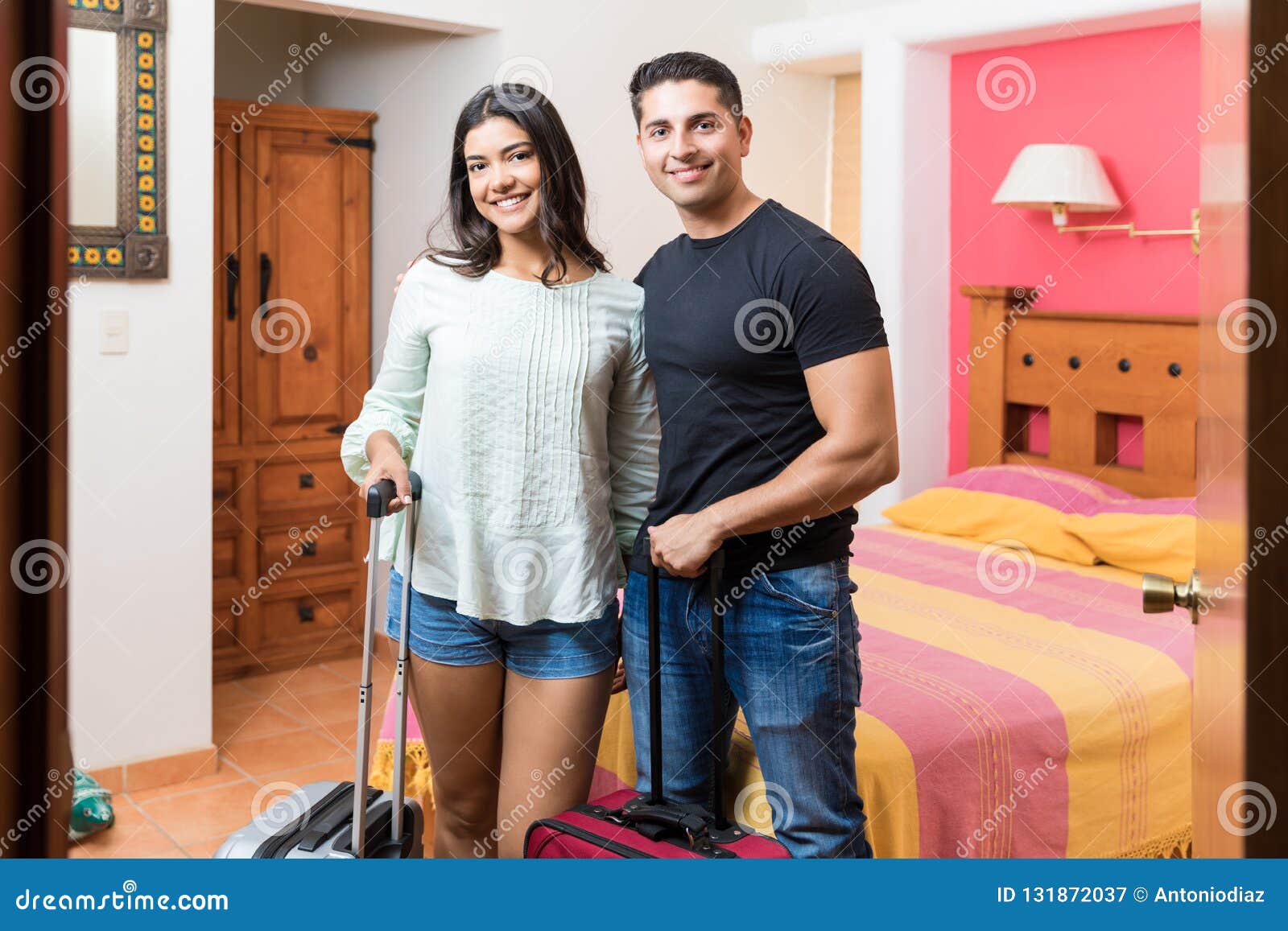 Smiling Partners Arrived With Baggage In Hotel Room Stock Image Image