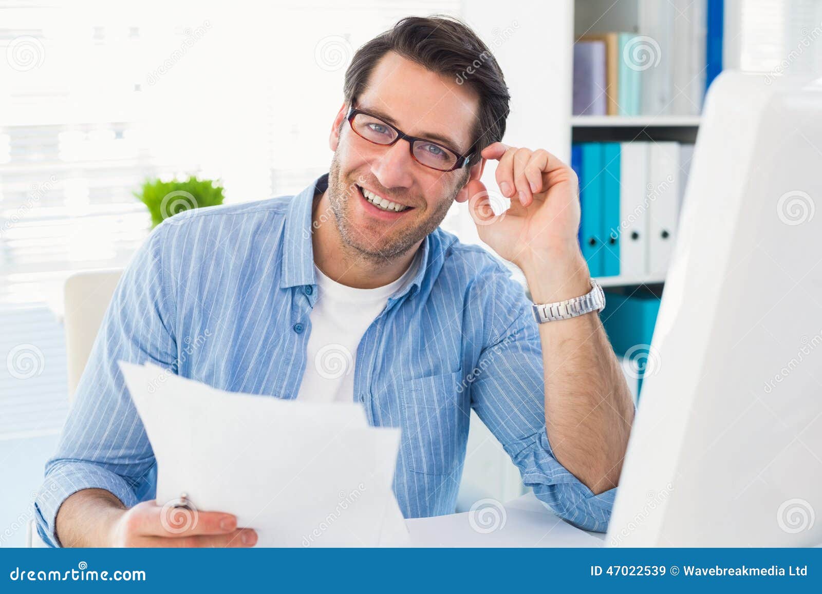 Smiling Photo Editor at Work Holding Contact Sheet Stock Image Image