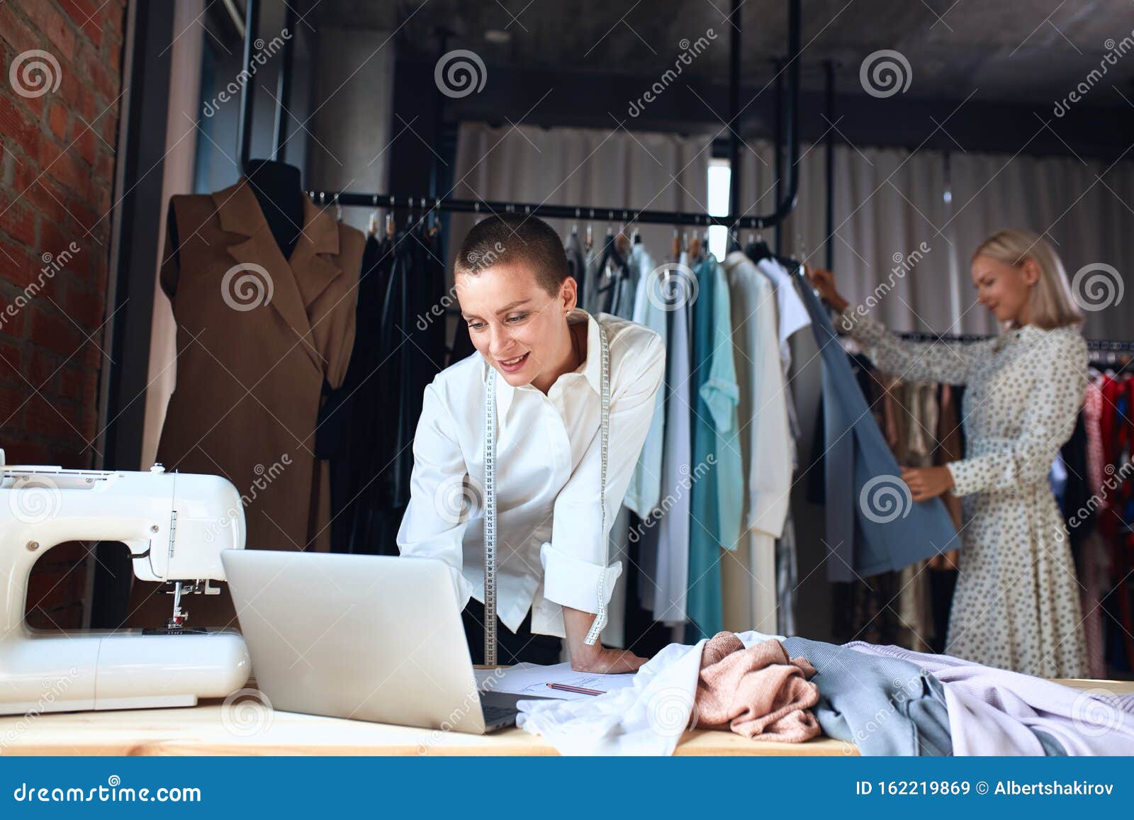 Smiling Positive Tailor Look at Laptop Stock Image - Image of clothes ...