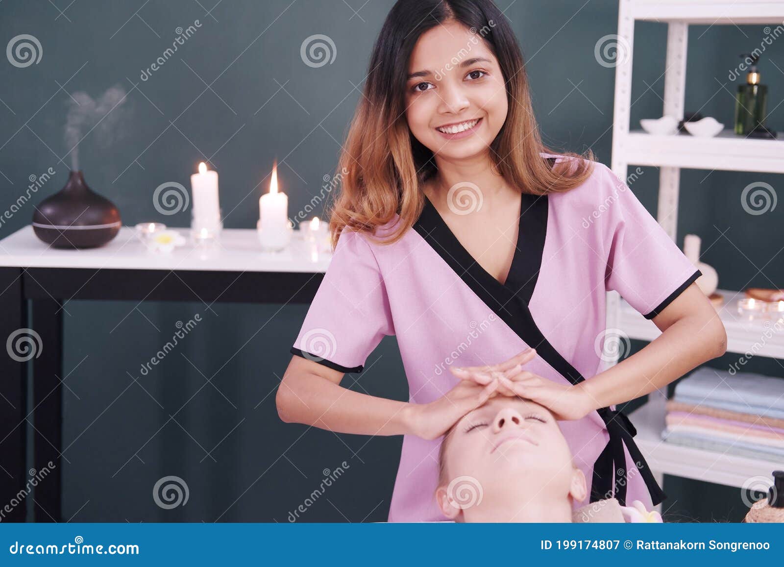 Smiling Professional Asian Thai Massage Therapist Woman Is Making