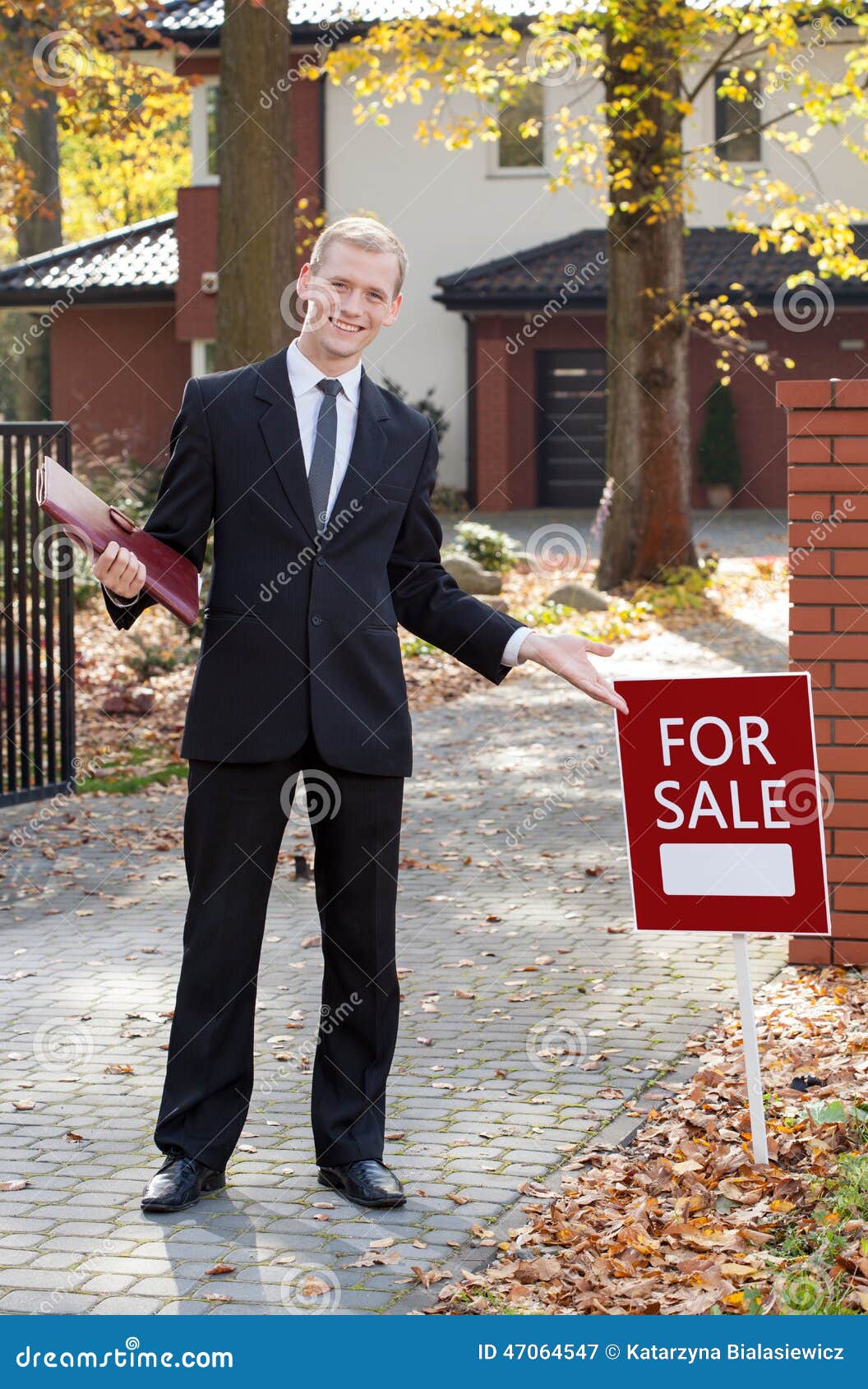 Smiling real estate broker stock image. Image of holding 47064547