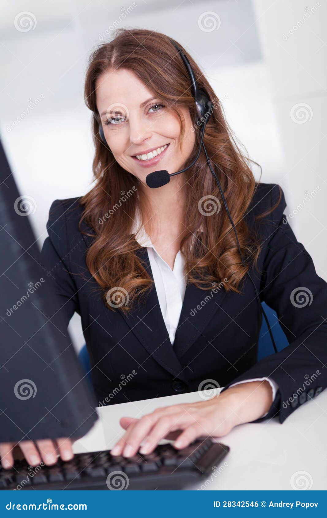smiling receptionist or call centre worker