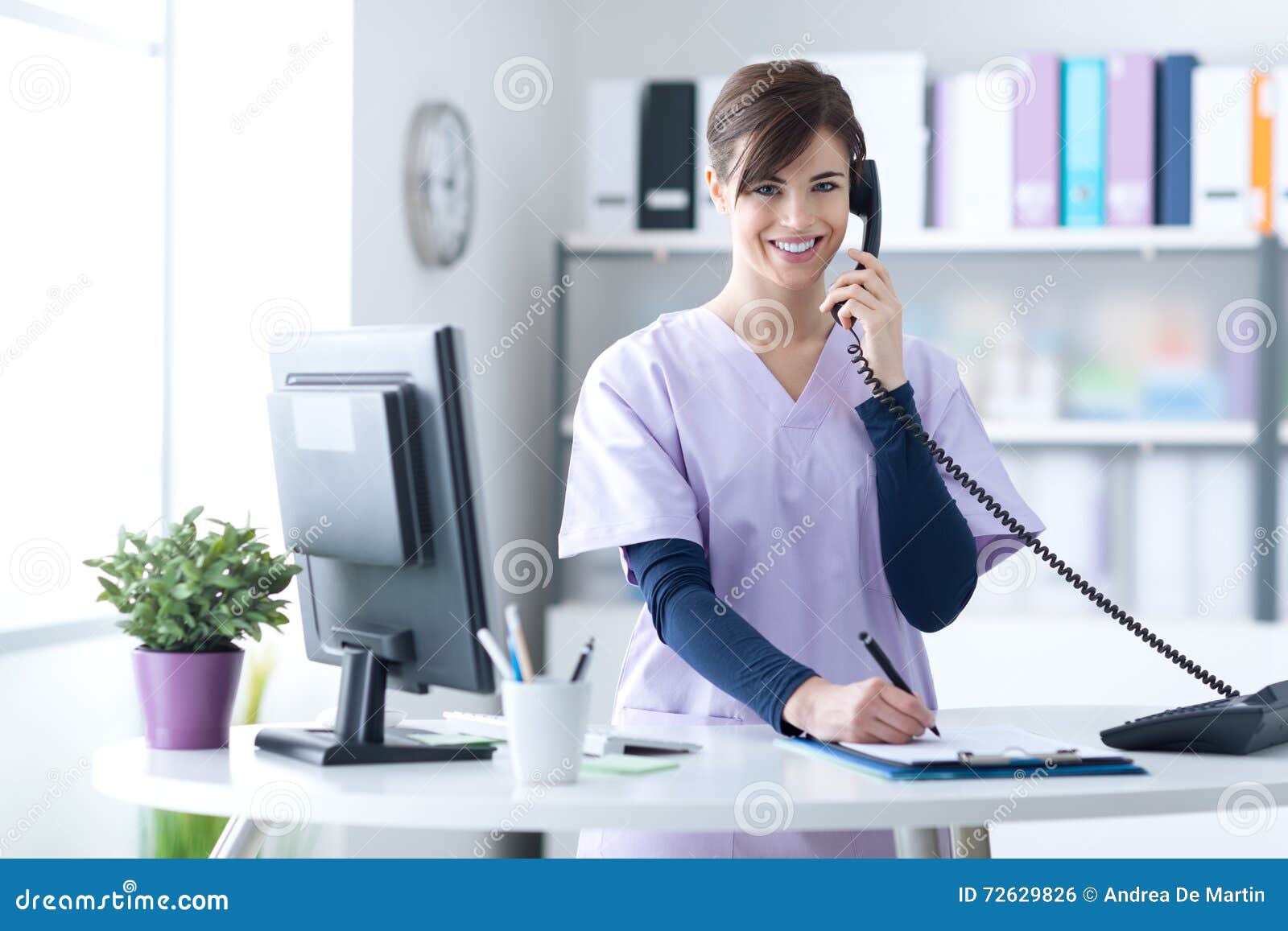 smiling receptionist at the clinic