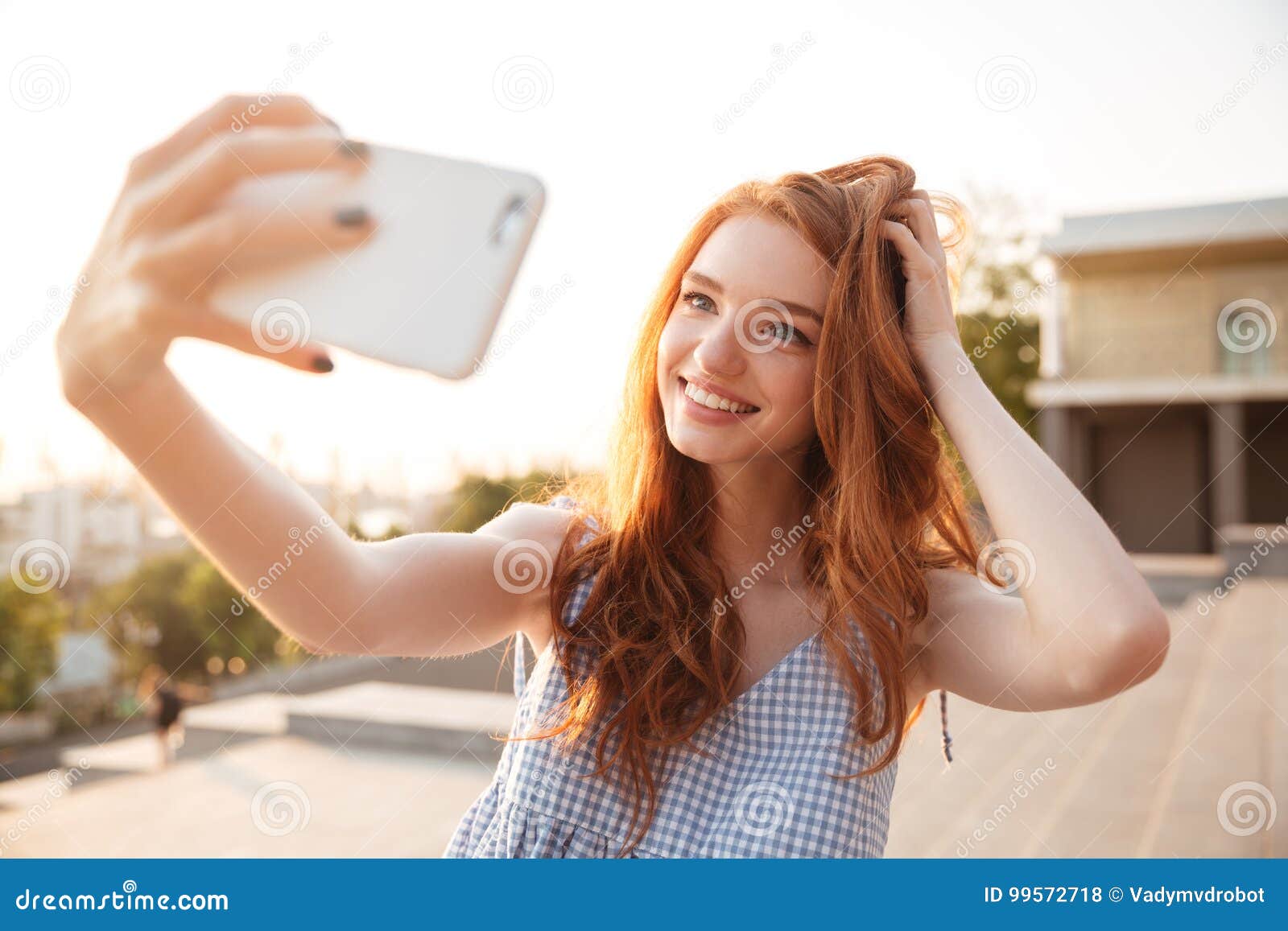 busty redhead bikini selfie