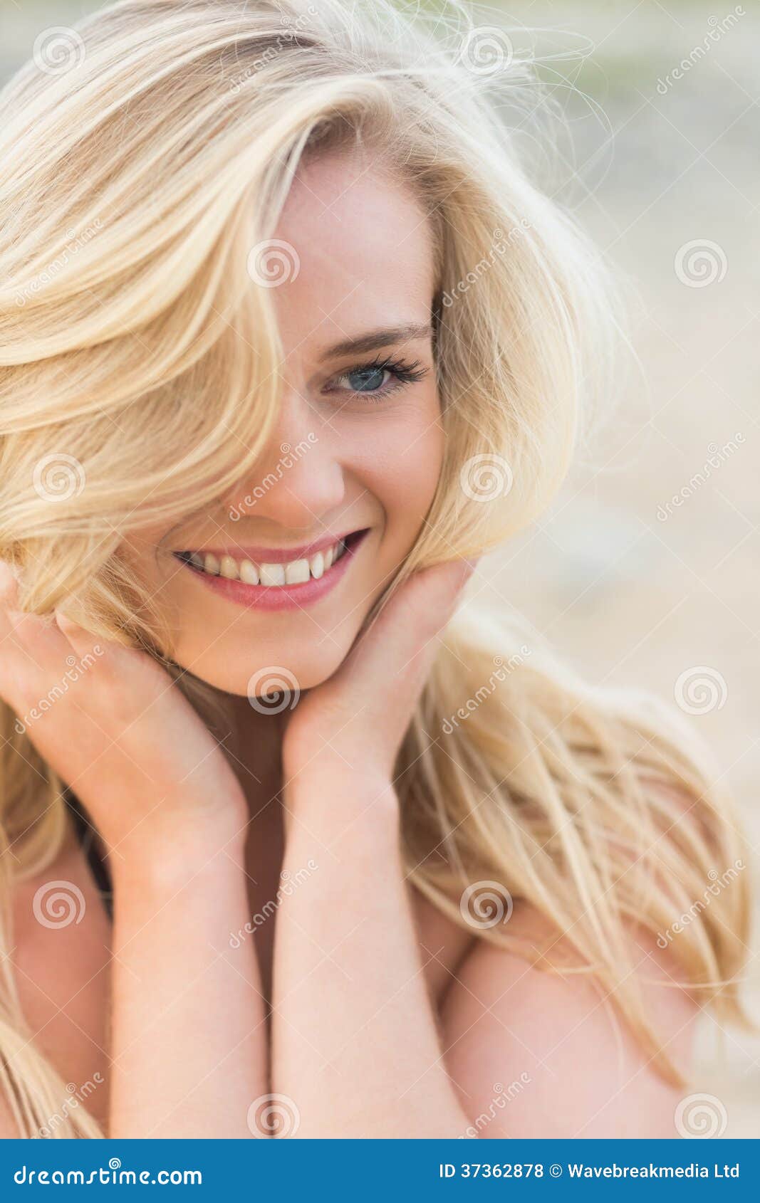 Smiling Relaxed Blond Looking Away at Beach Stock Photo - Image of