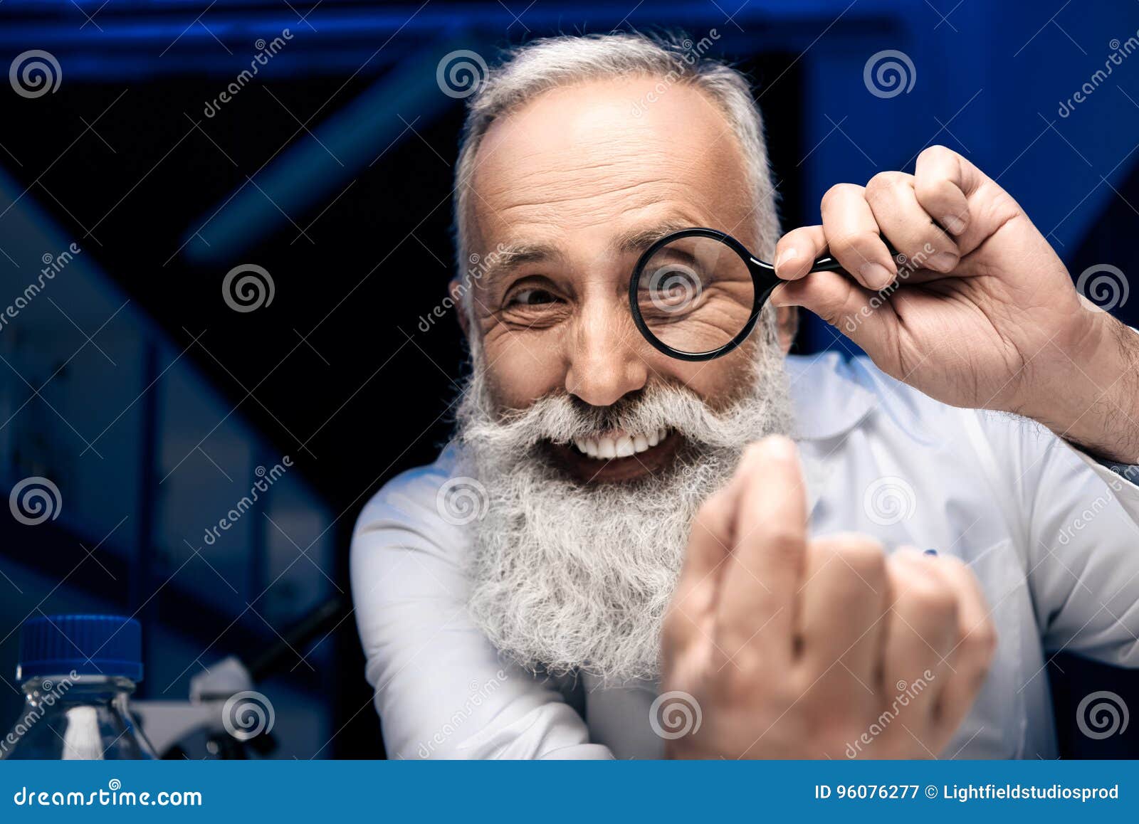 Smiling Scientist Looking at Hand through Magnifying Glass in Laboratory Stock Image Image of
