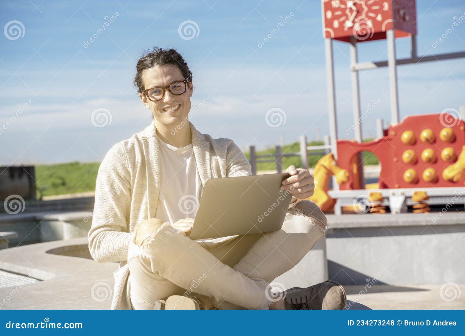 smiling in smartwork with laptop