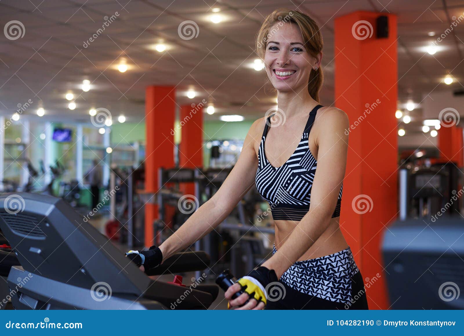 Smiling Sportive Woman Walking on Treadmill Stock Photo - Image of ...
